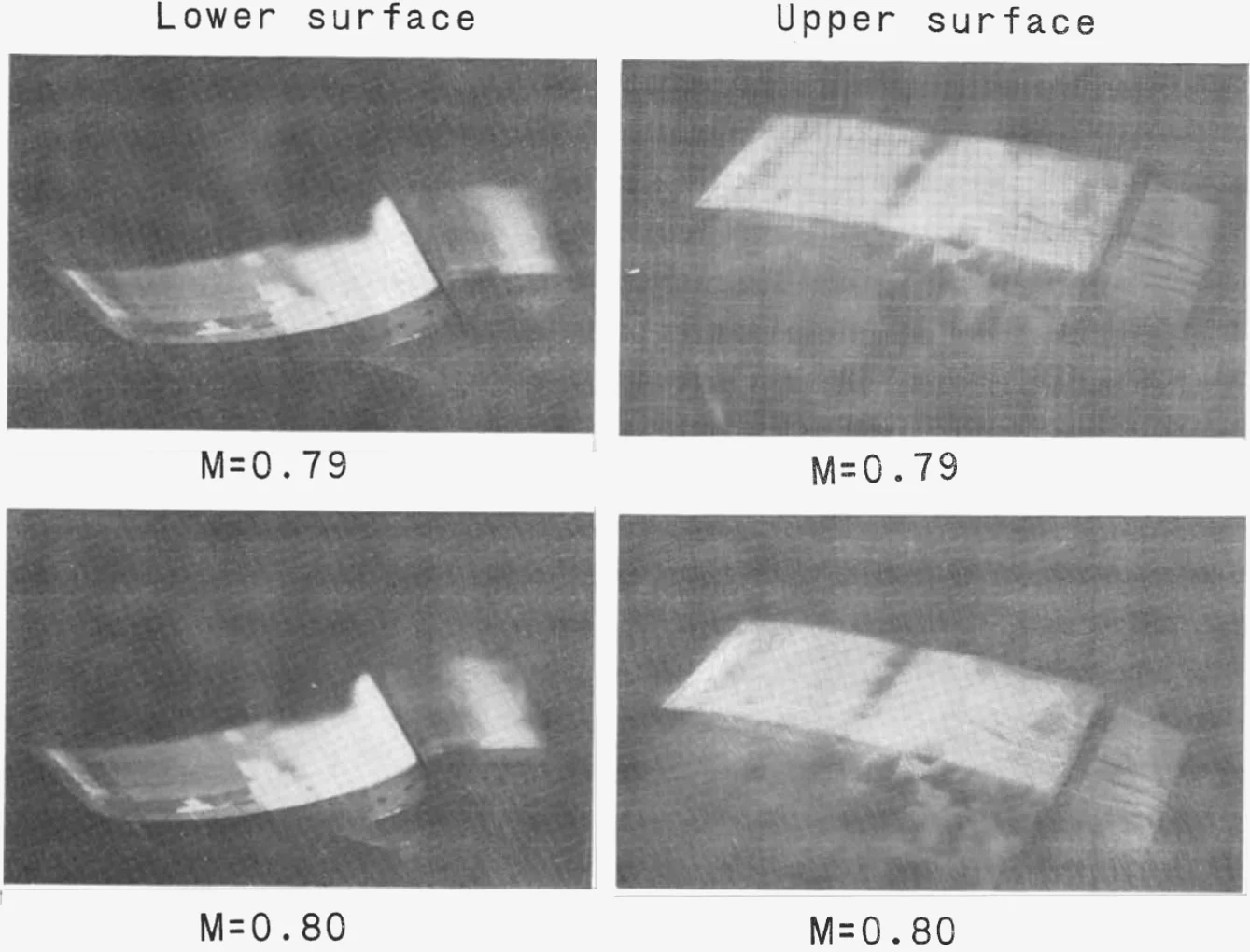 Four photographs of fluorescent oil-flow patterns on the lower and upper surfaces of the supercritical airfoil model at Mach 0.79 and 0.80